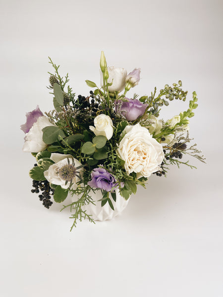 Fresh flower arrangement in cool tones (4" white vase)