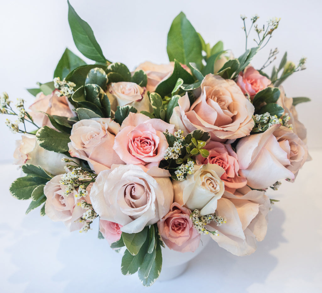Pastel rose arrangement in a compote – GIA AND THE BLOOMS