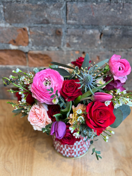Valentine’s Day arrangement in a heart checkered gold metal vase