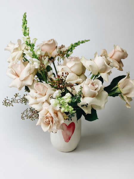 Pastels floral arrangement in a Watercolor Heart vase