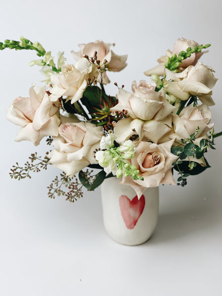 Pastels floral arrangement in a Watercolor Heart vase