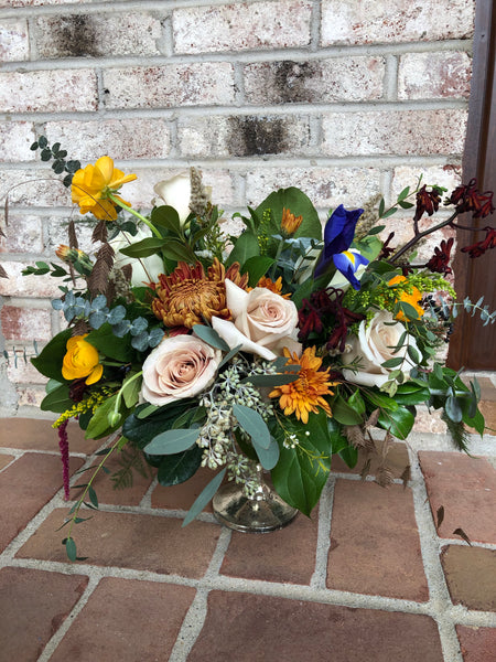 Large compote arrangement in fall tones